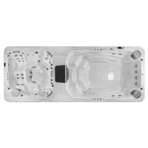 Top-down view of a white rectangular hot tub with multiple seating areas and numerous jets.