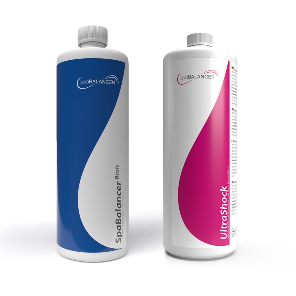 Two spa chemical bottles side by side: a blue-labeled SpaBalancer Basic on the left and a white bottle with pink label (Ultrashock) on the right.