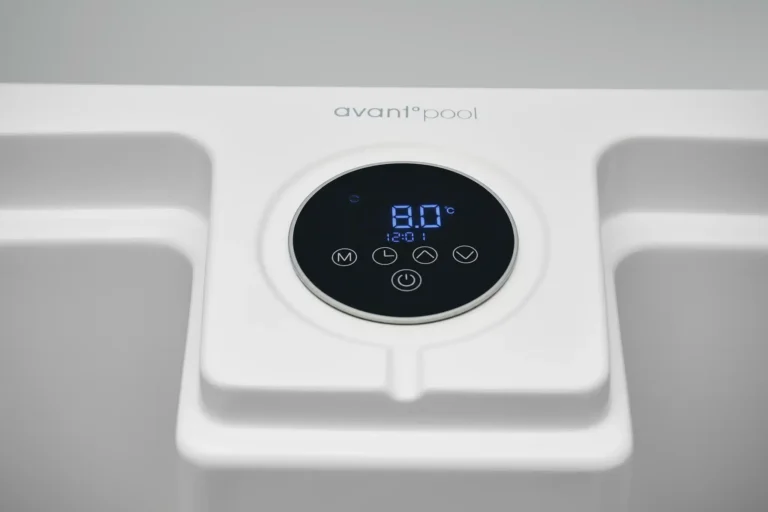 AvantPool pool control panel: white unit with circular black display showing 8.0°C and time 12:01, brand visible above the display